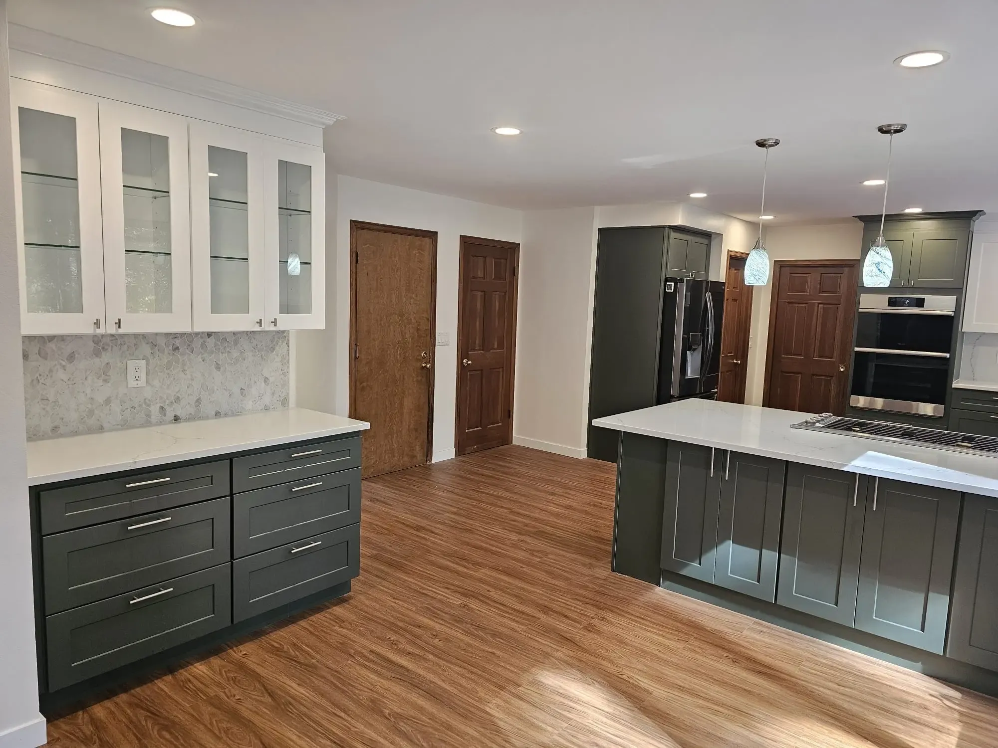 Light wood cabinets with open shelving and high-end hardware